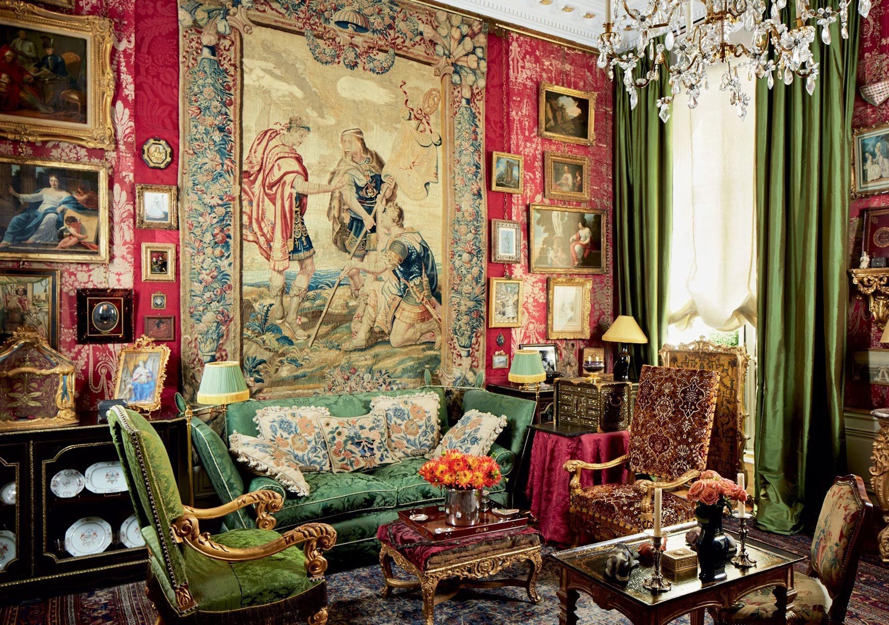 room with expensive items: luxury armchairs, expensive carpets, old paintings