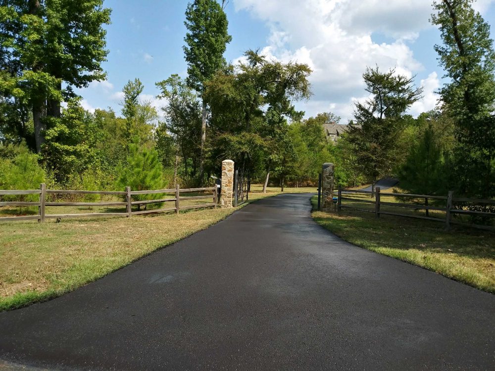 asphalted road - entrance to the estate